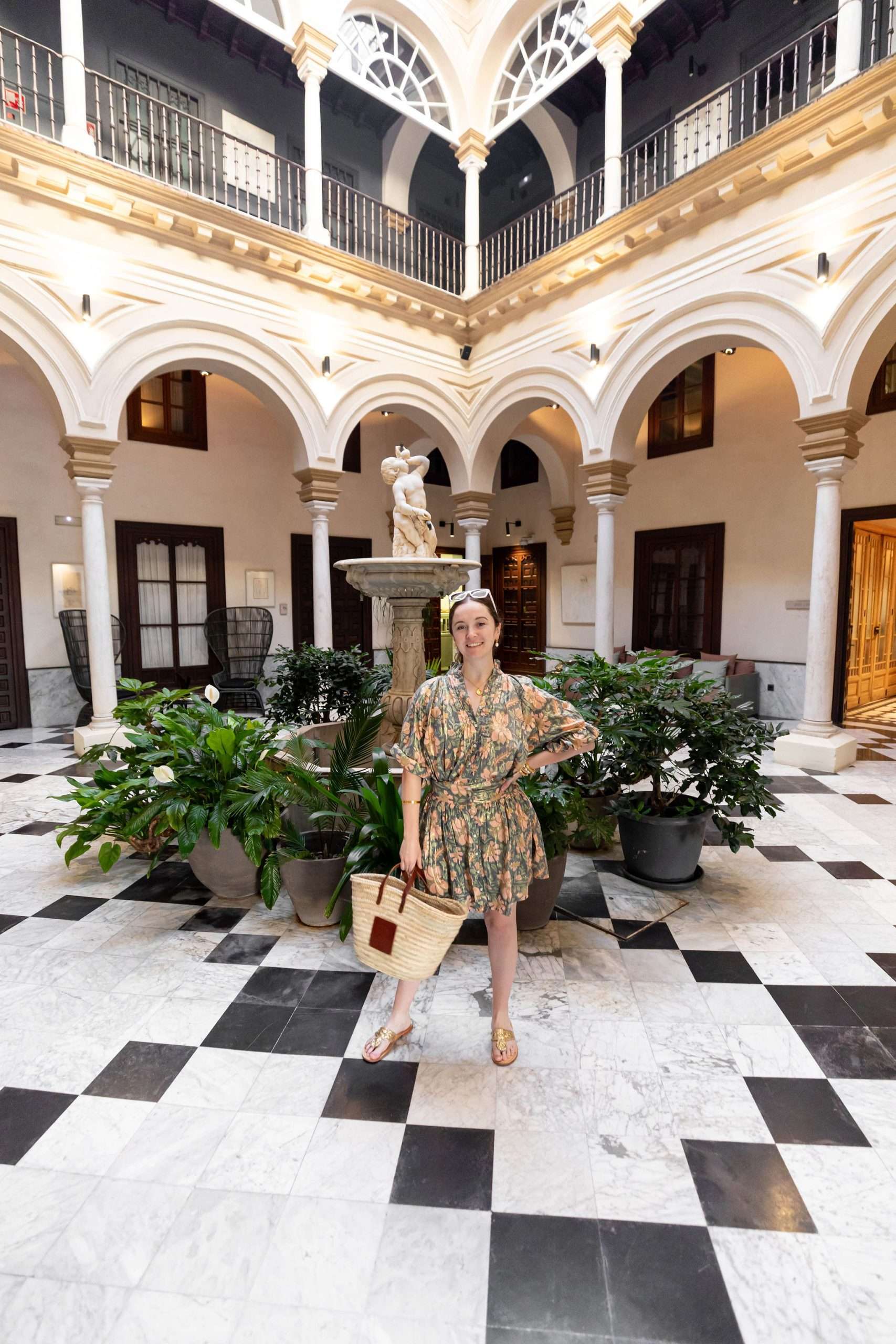 Green Juliet Dunn Dress from Halsted Palm Beach Sandals Sunglasses in Sevilla Spain Worn by Luxury Travel Writer Fashion Blogger Annie Fairfax